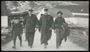 Image of King Rood, Unidentified Man, Robert Peary and Henry E. Rood Walking Ashore